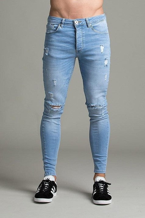 Denim jeans with ripped feet